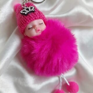 Cute pink fluffy doll keychain with knitted hat and crown decoration