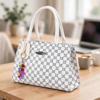 White monogram print women’s handbag with double top handles and colourful bead charm, front view